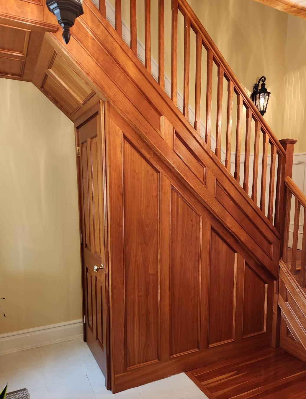 Stained Edwardian staircase and panelling