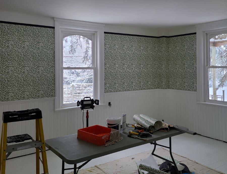 Classic-style wallpaper professionally applied in older home